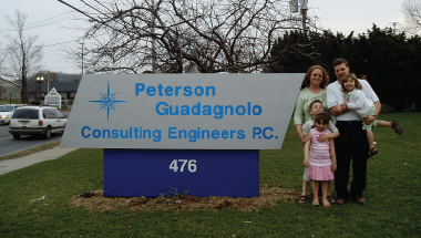 peterson guadagnolo consulting engineers p.c. sign in front of office