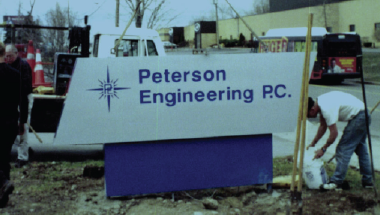 peterson engineering p.c. sign in front of office 2000