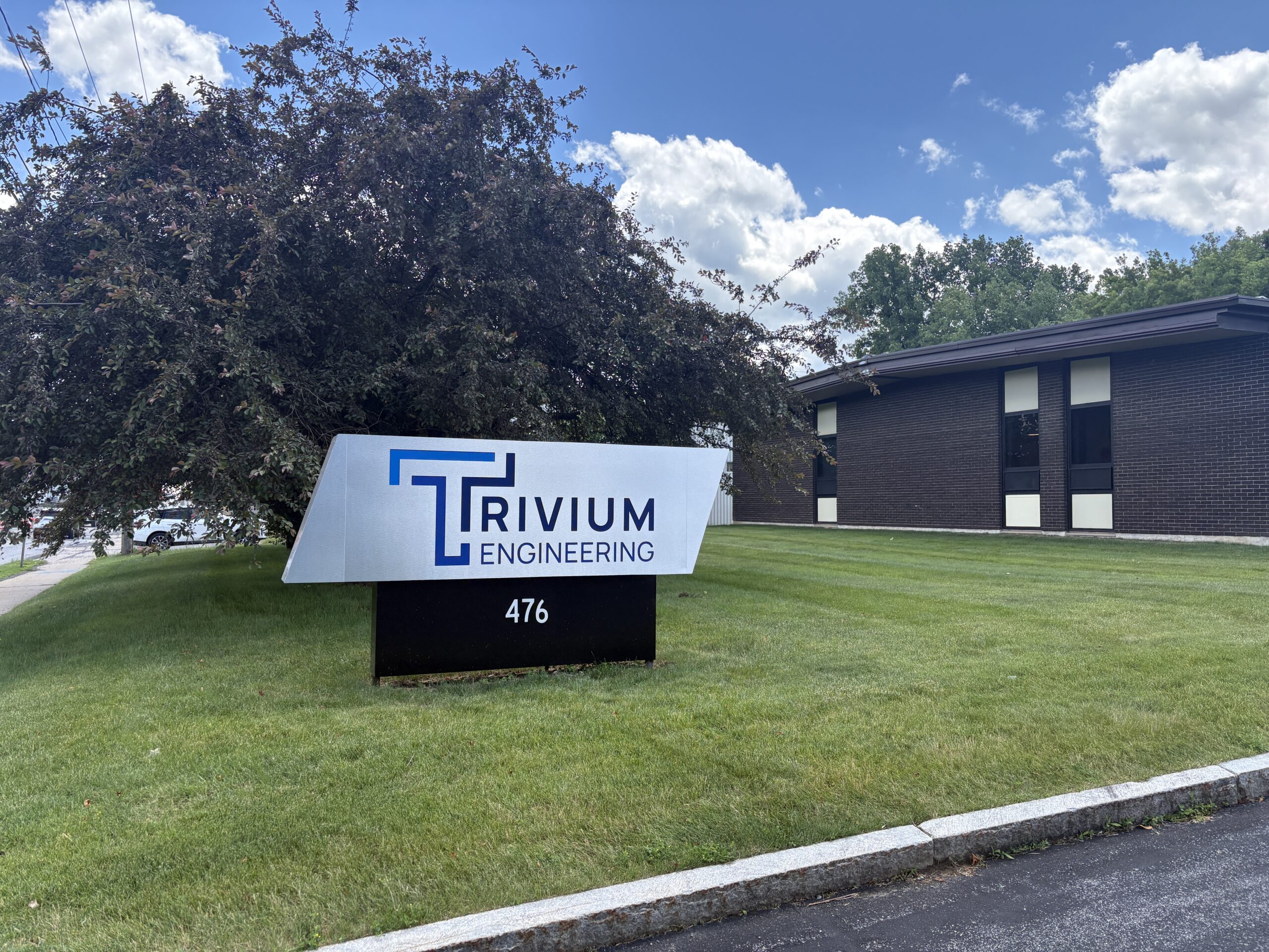 trivium sign in front of office